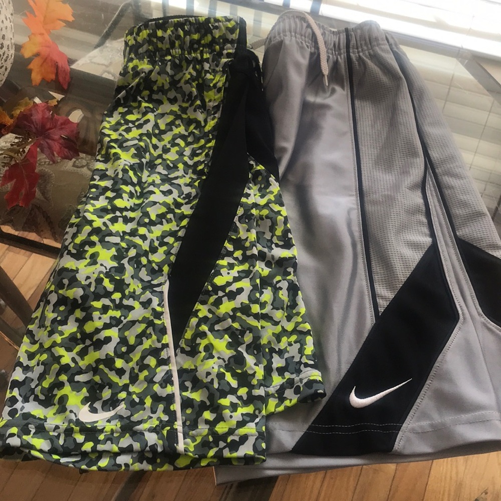Two pair of Nikes boys shorts size medium